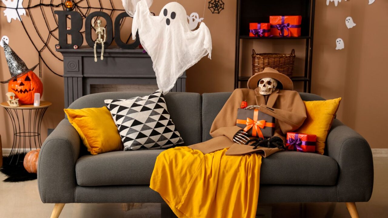 Ghost and skeleton decor in a living room.