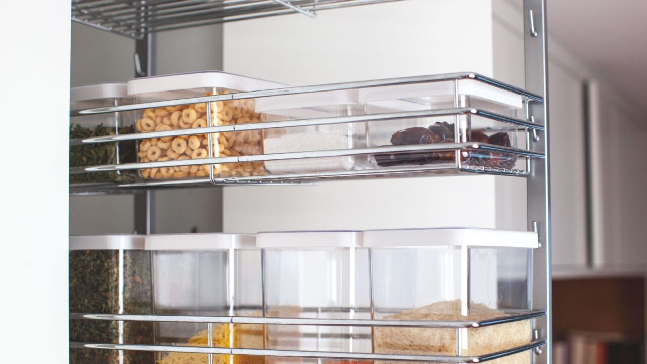 A back-of-the-door pantry organizer to store snacks and spices in kitchen. An organized pantry will help to keep clutter off of your counters.