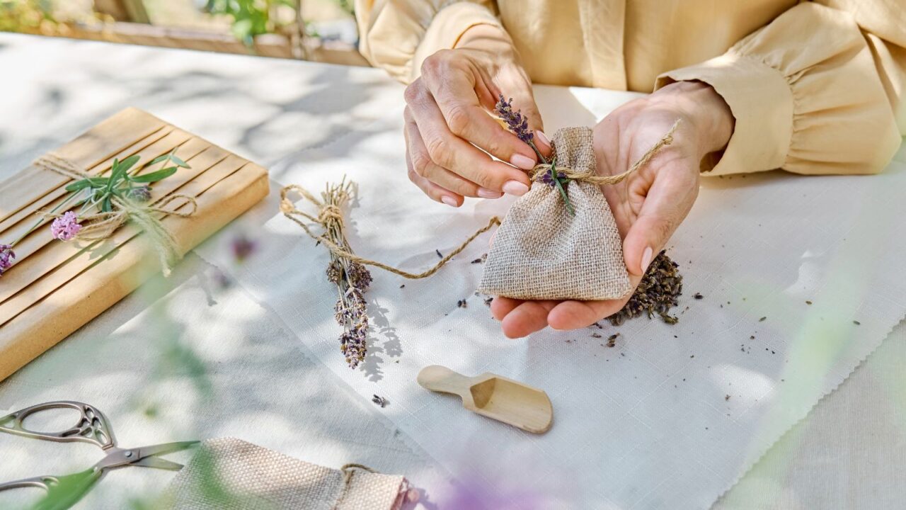 Woman making DIY lavender sachets for fragrance