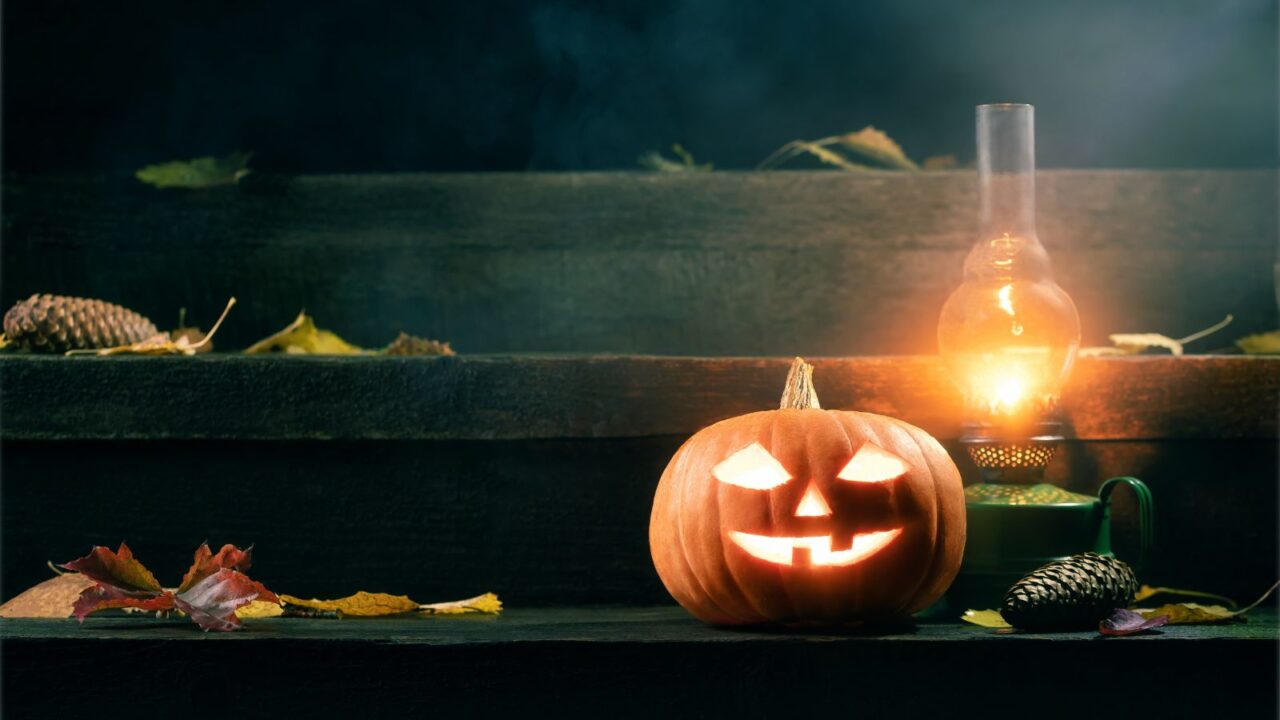 Pumpkin jack o lantern and kerosene oil lamp