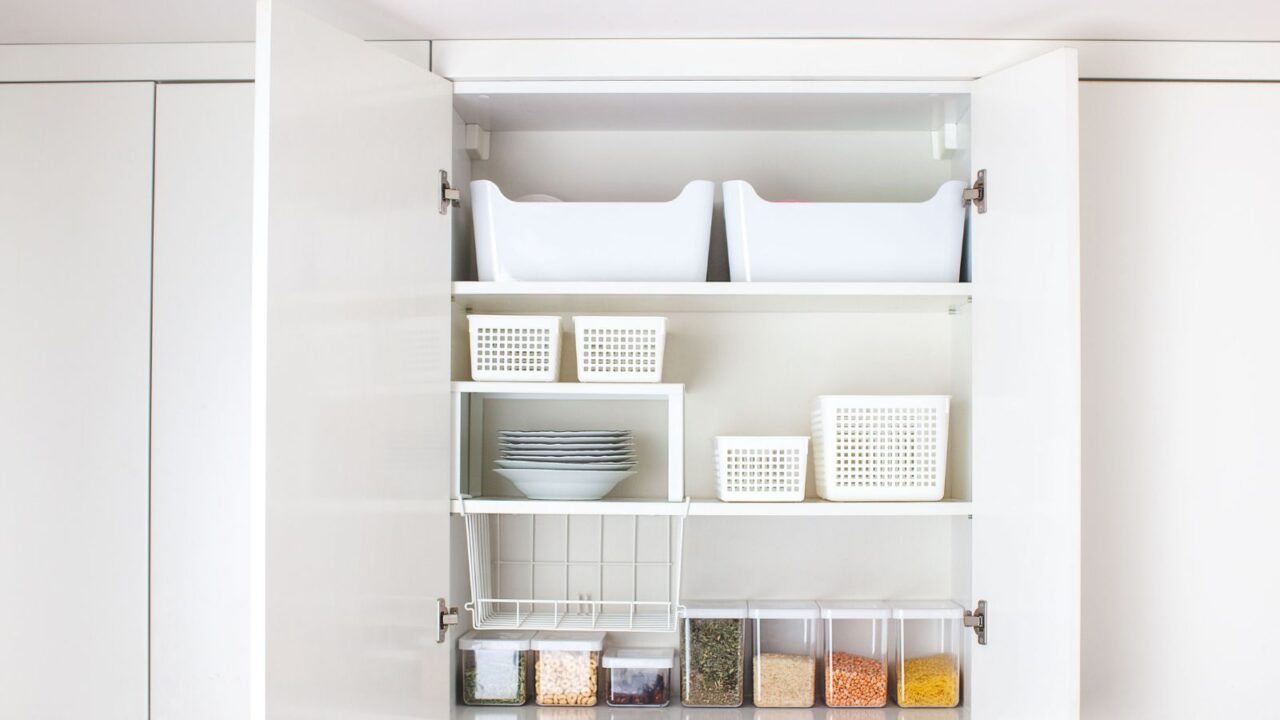 House decor ideas. Storage in the kitchen. Home organization. White shelf and modern interior.