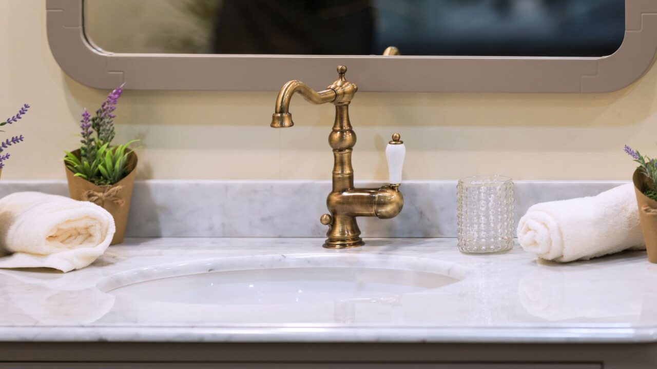 beautiful Vintage faucet on a marble countertop