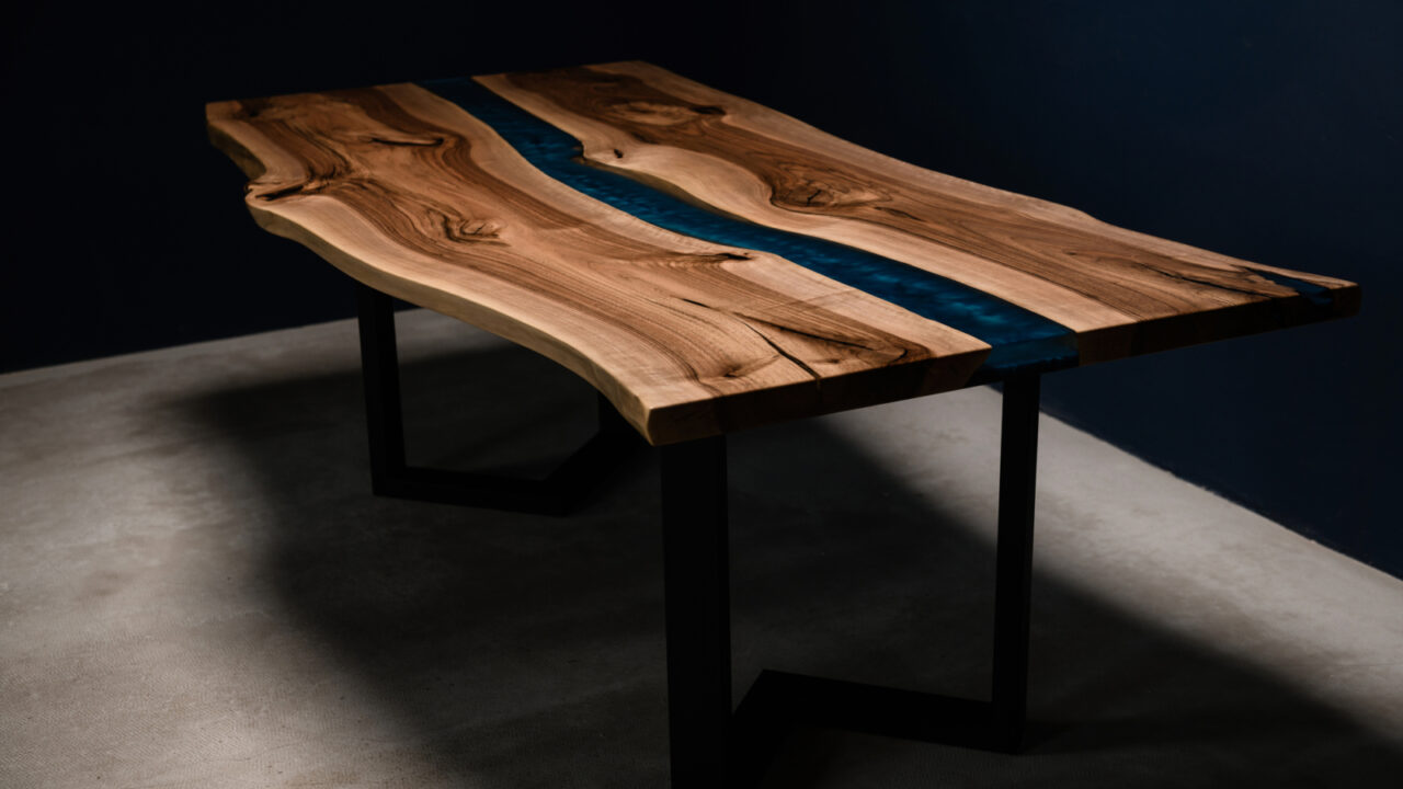 large rectangular table made of unedged wood and oxide resin