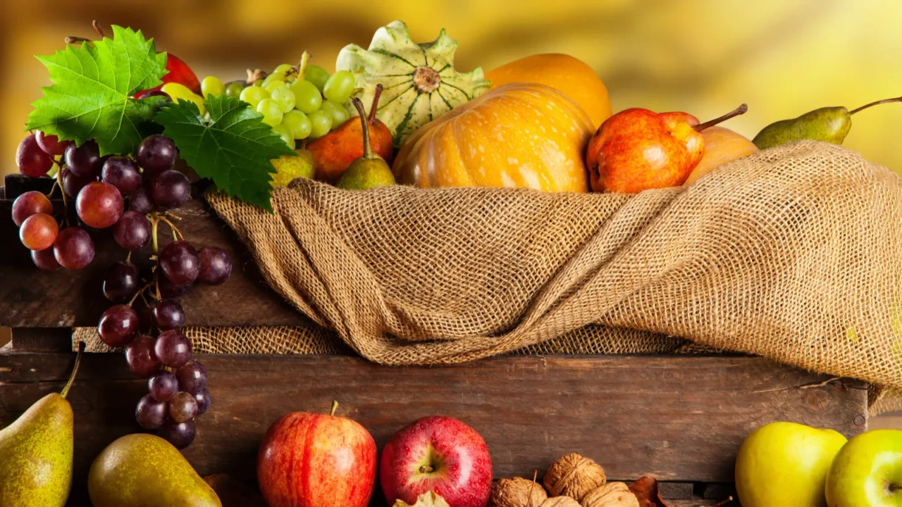 Autumn fruit and vegetable in wooden box