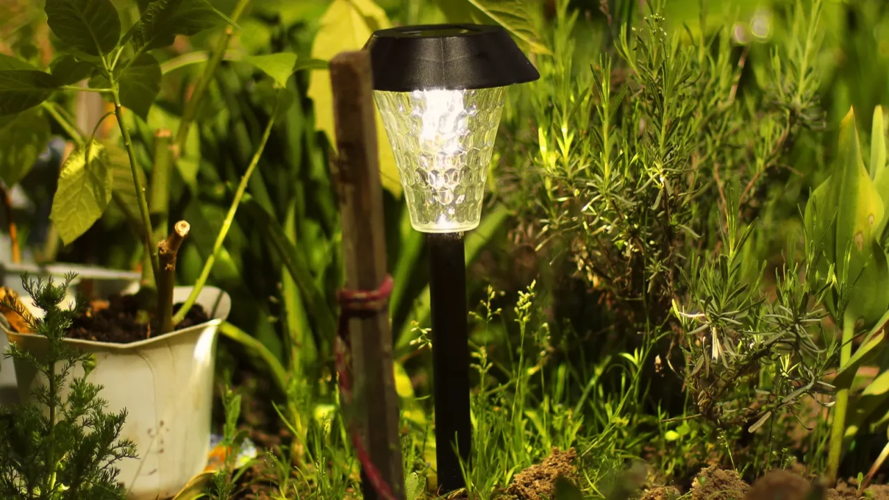 Beautiful lamp in the garden with solar battery.