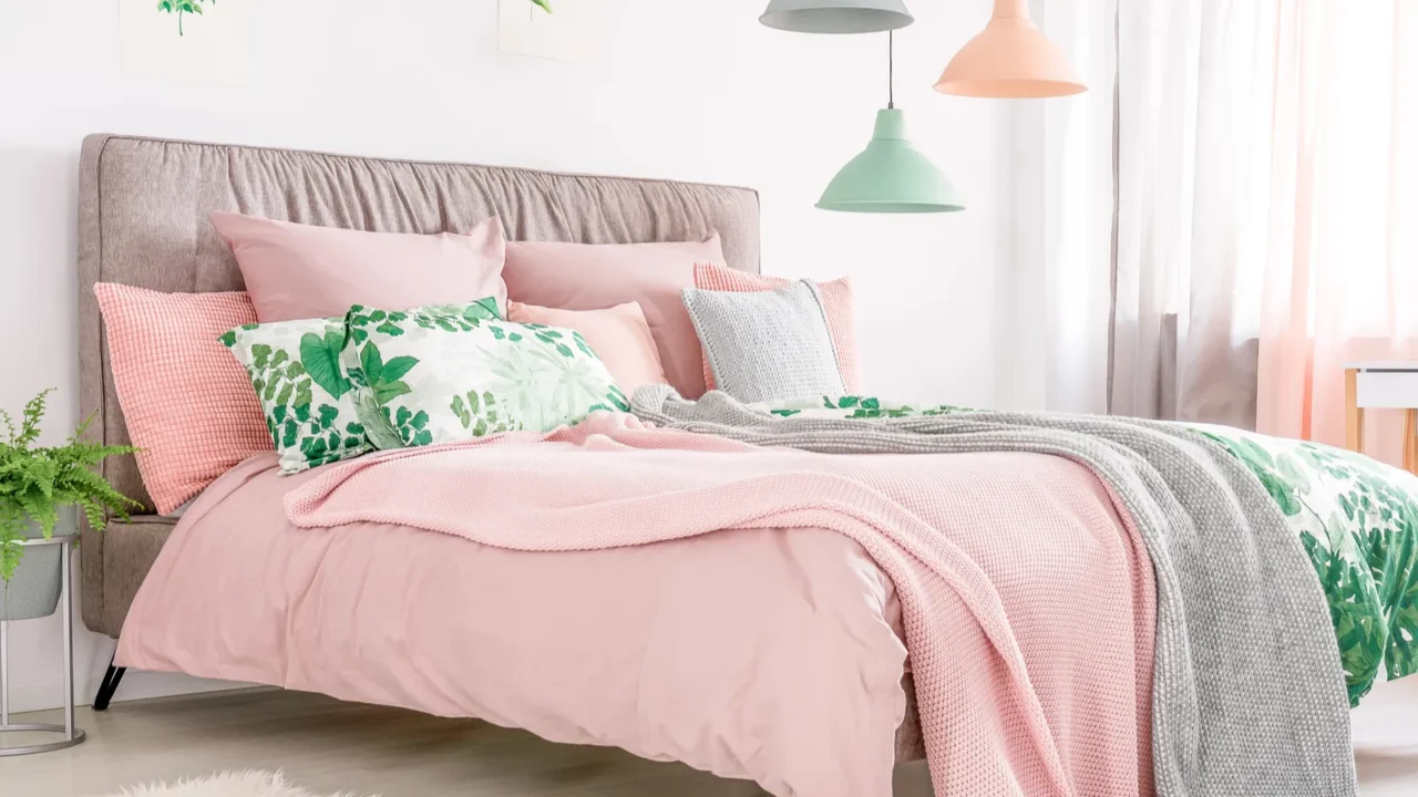 Bed with pastel pink bedding