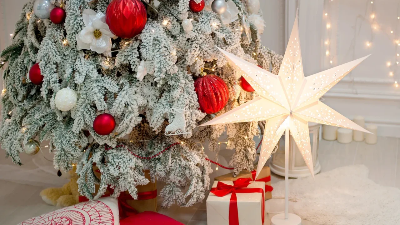 Christmas tree and christmas gift boxes in interior