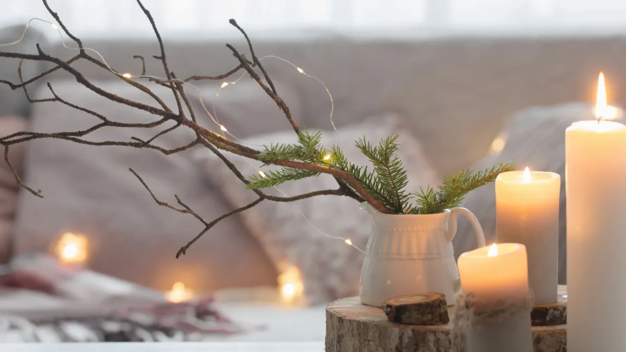 Composition of candles on white table