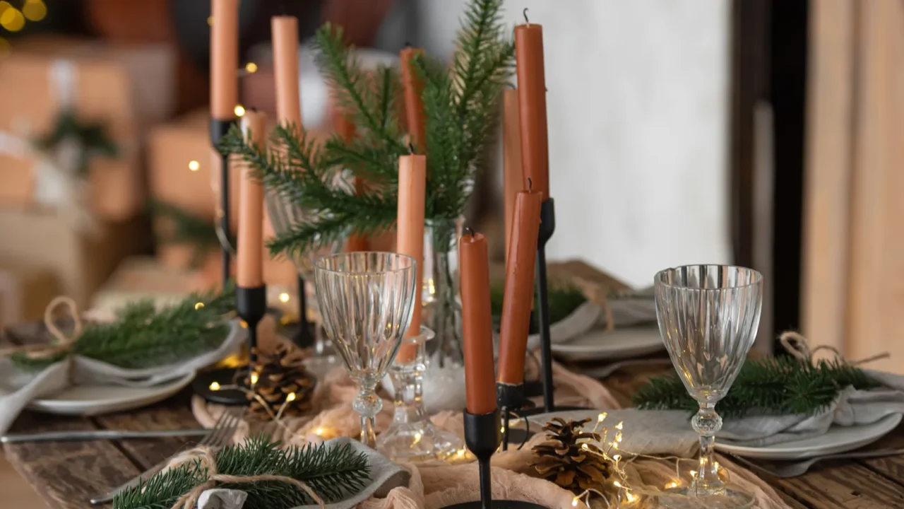 New Year decorations on the table. Surfing the table with New Year's decorations. New Year's loft style