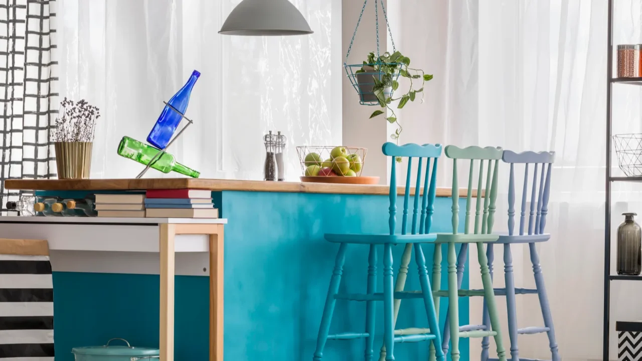 Pastel barstools in colorful kitchen