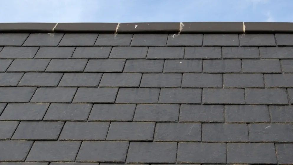 Slate roof against blue sky