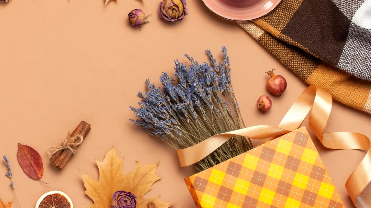 Dried flowers and plaid sheet and cloth with a ribbon.