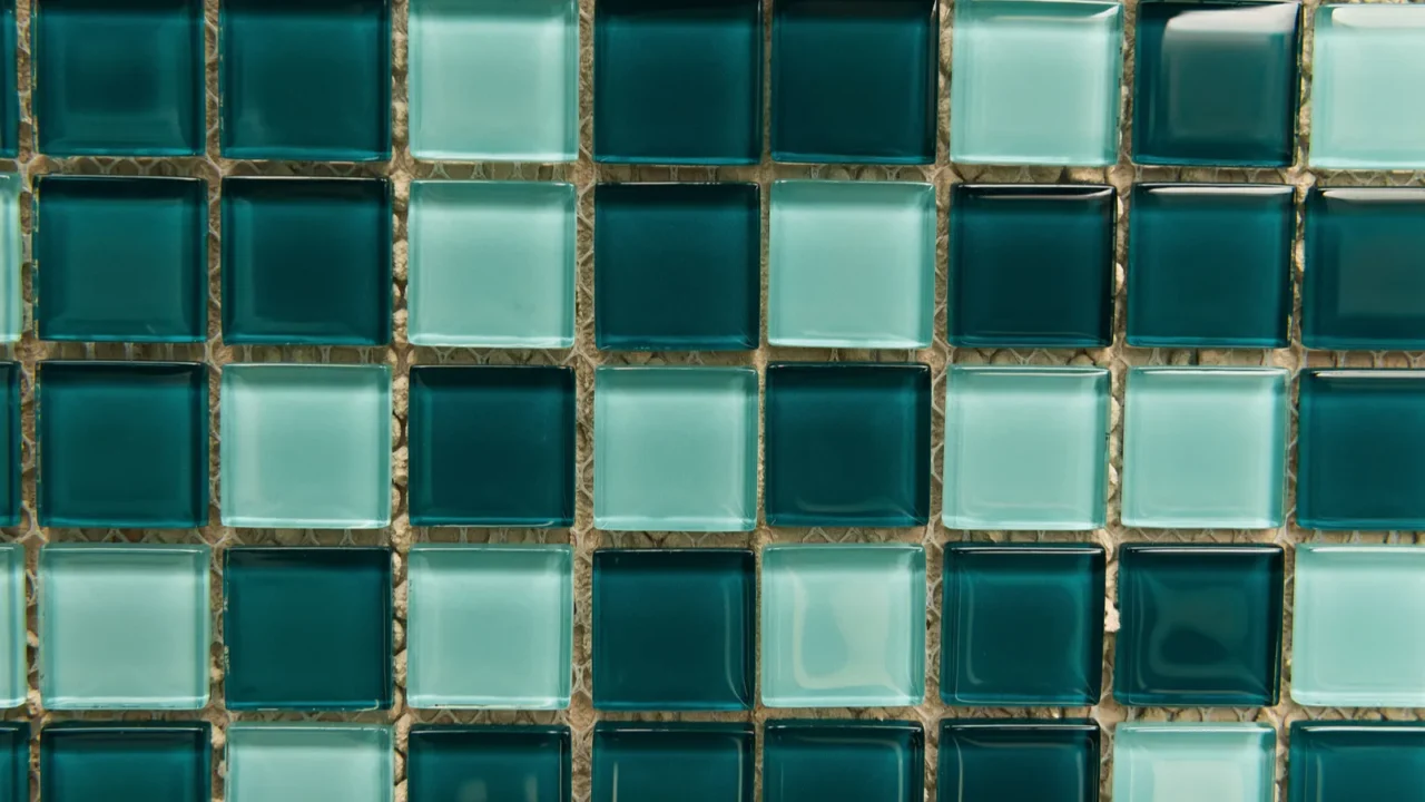 background of small green and blue glass tiles top view