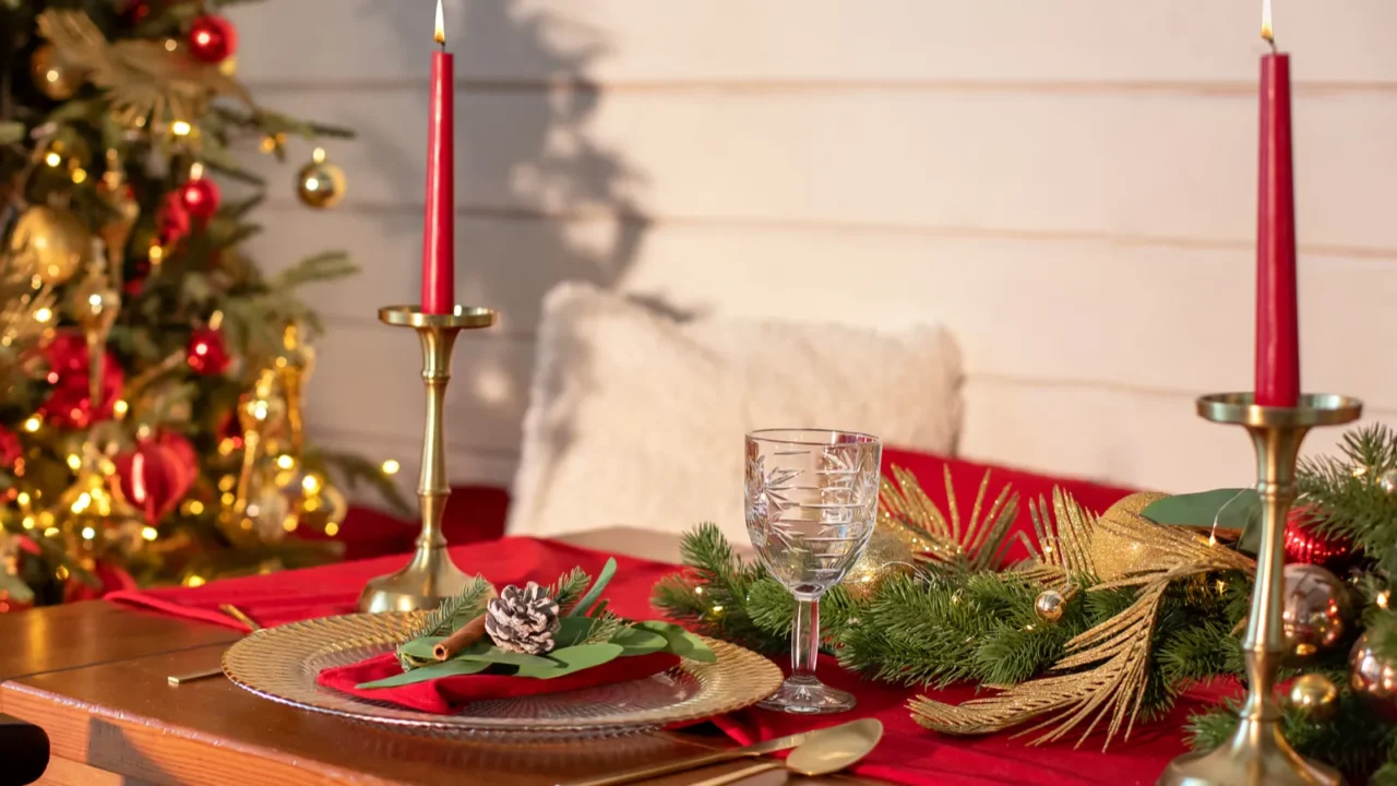 beautiful table setting with christmas decorations and dishware in living