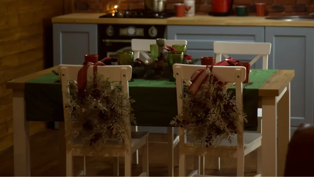 blurred background  kitchen interior decorated for christmas in red