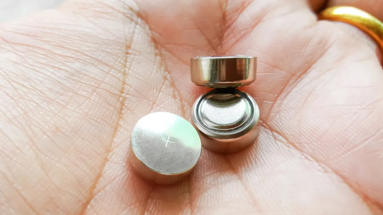 button cell battery on hand