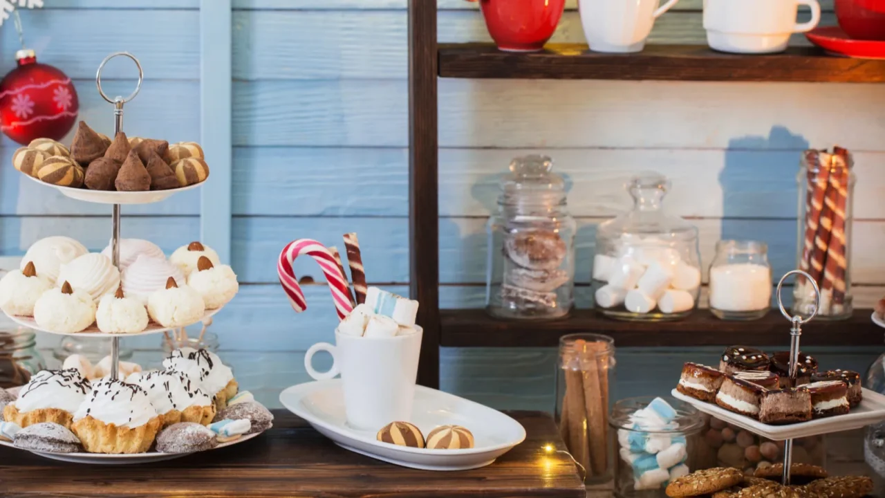 christmas bar cacao decoration with cookies and sweets on blue