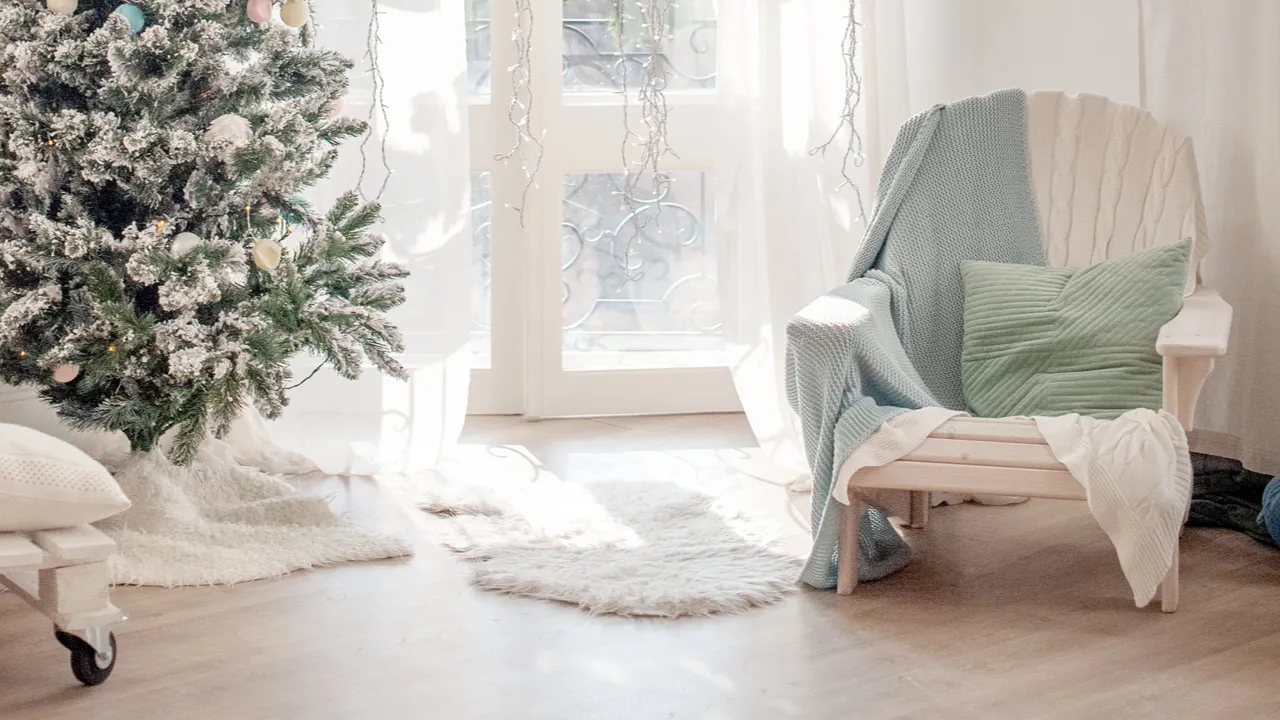 christmas tree with delicate decorations in the interior