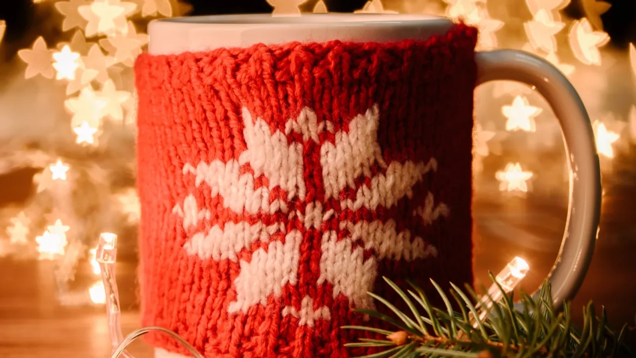 close up view of cup of hot drink garland and