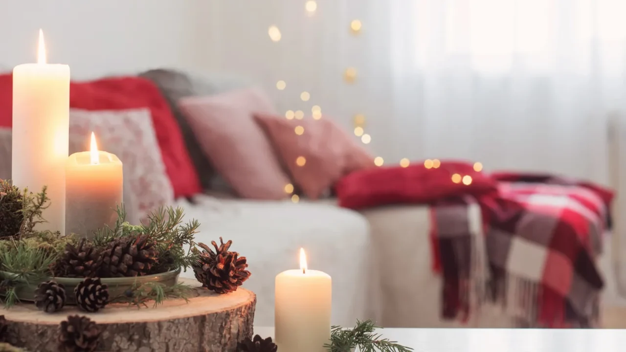 composition of candles on white table against the background