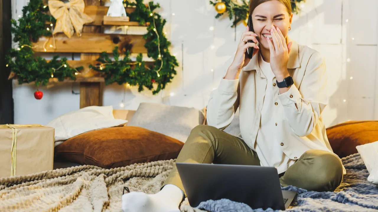 cute young woman talking on phone to prepare for christmas