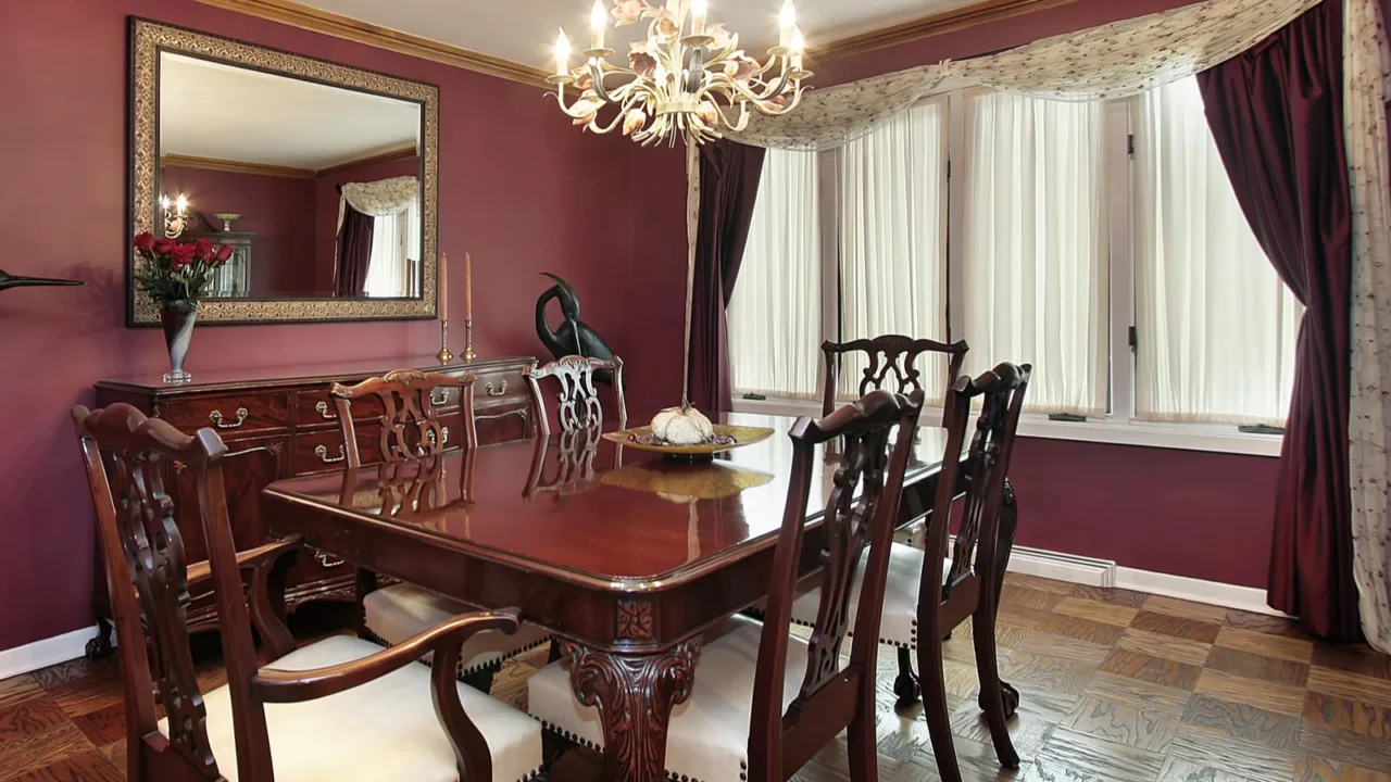 dining room with maroon walls