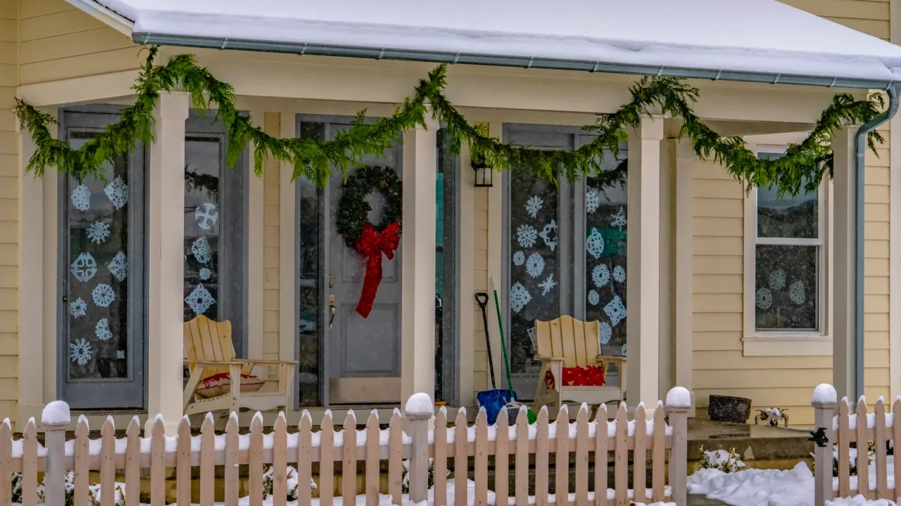 facade of home with christmas decoration in winter