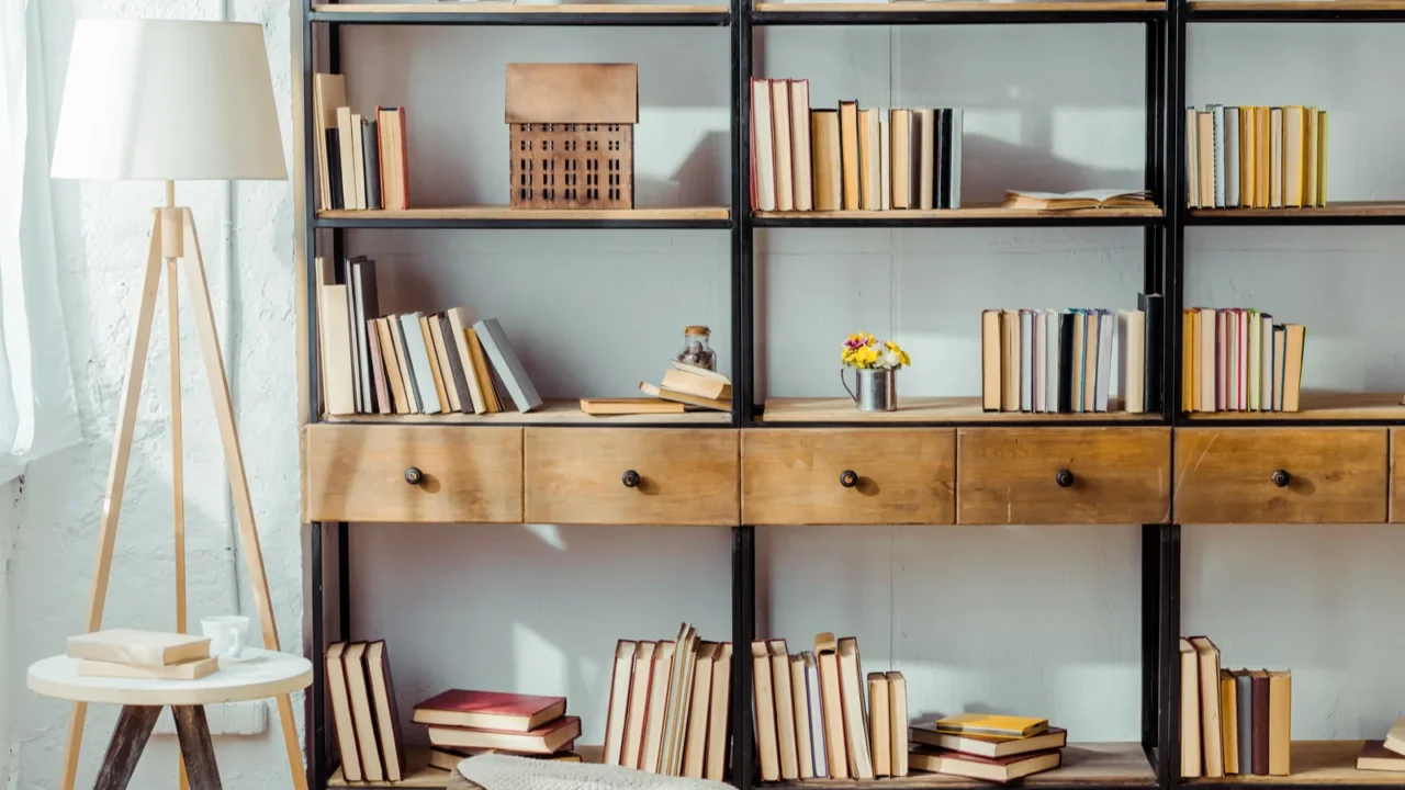 interior of living room with wooden furniture and books