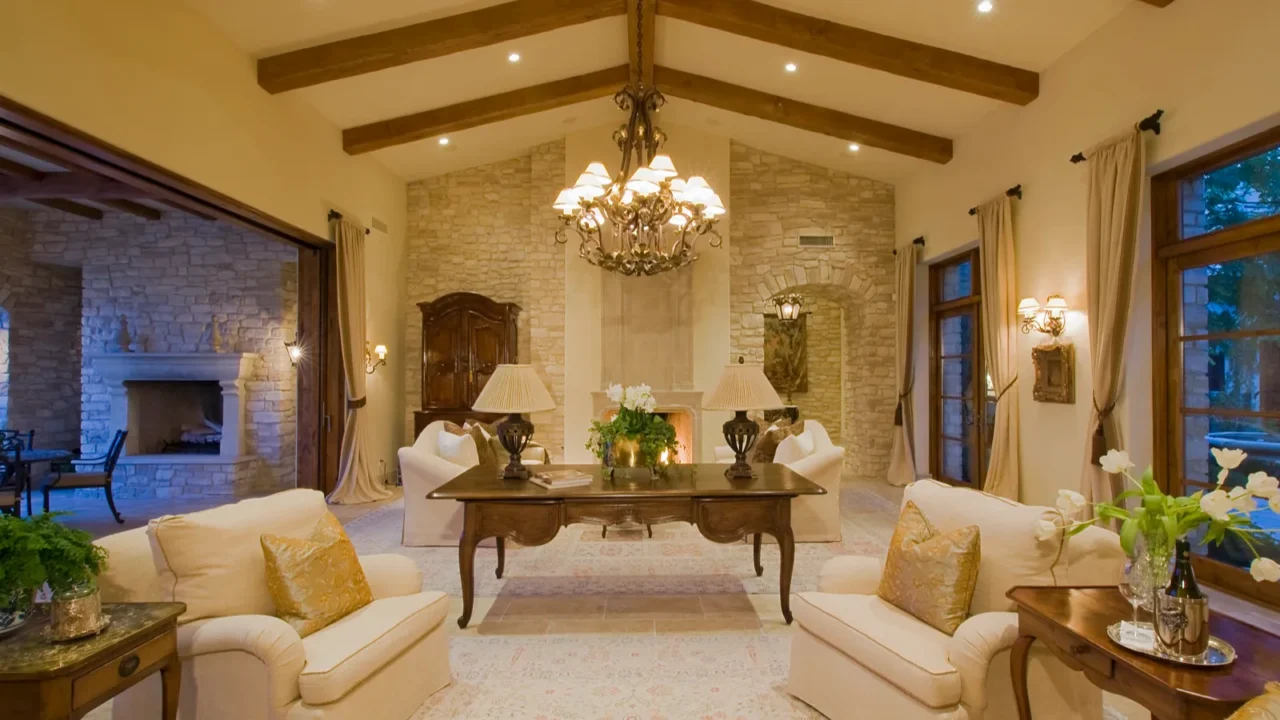 A big open and neutral color living room with dining table and sofas.