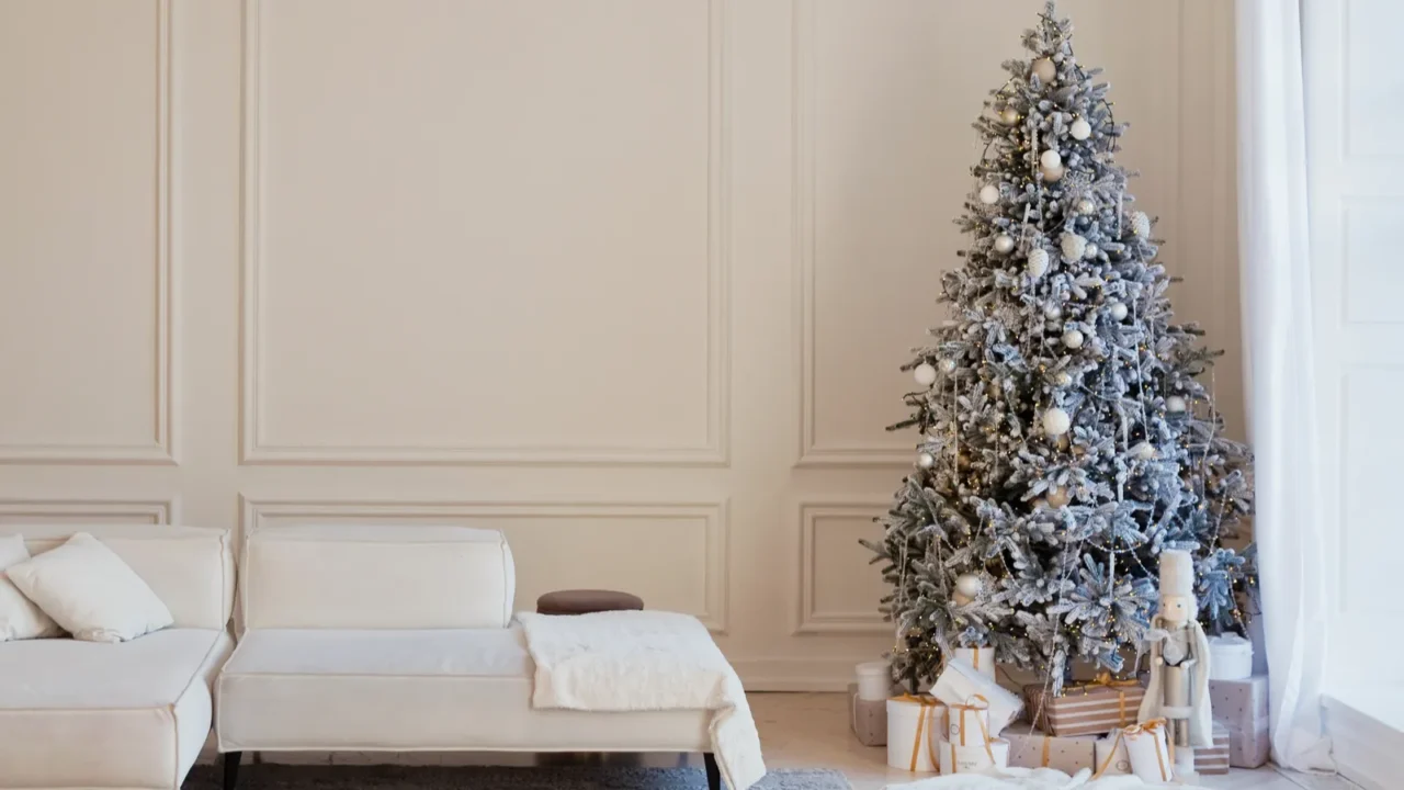 modern interior with white big sofa and christmas tree with