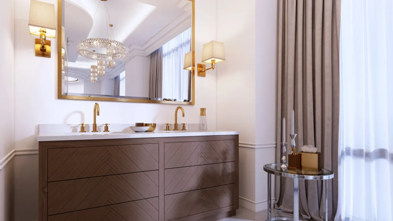 modern wooden vanity with a mirror in a gold frame