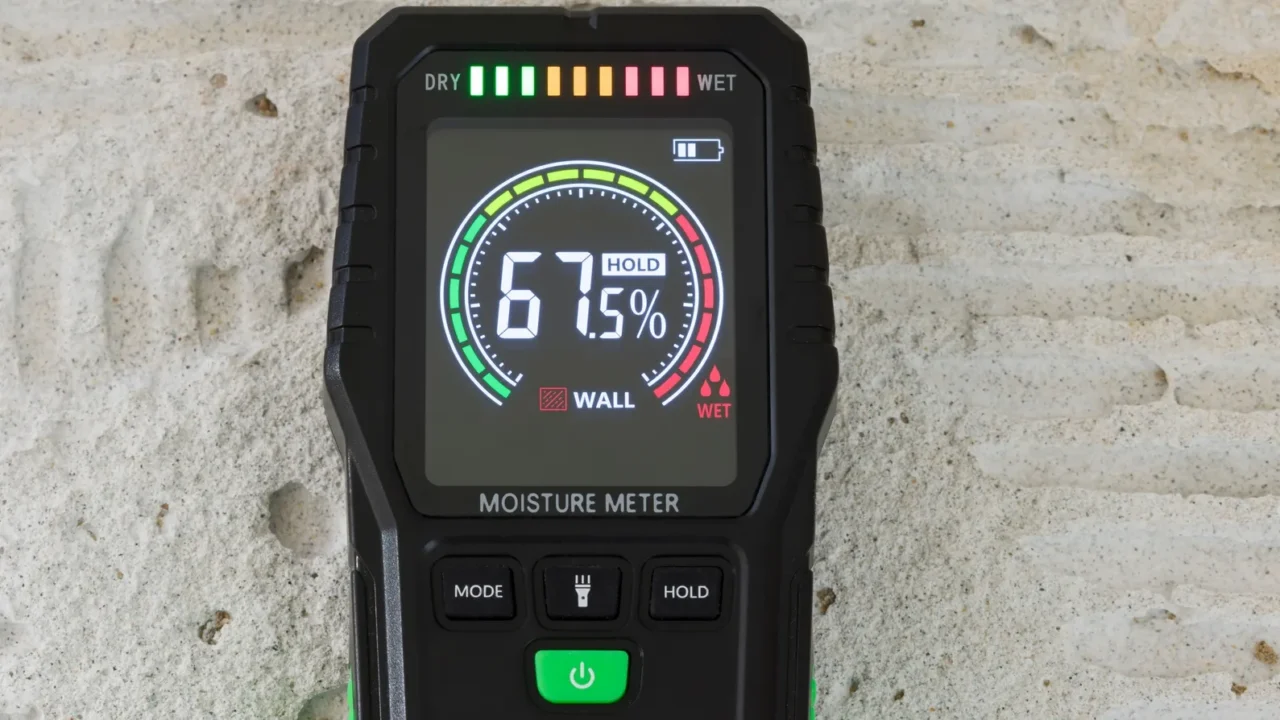 moisture detector moisture testing meter on a concrete floor reading