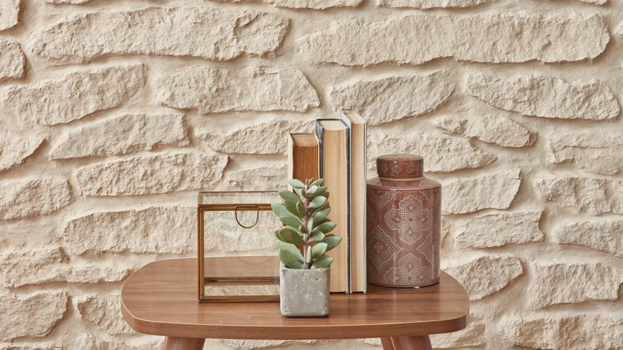 old books on table behind natural stone