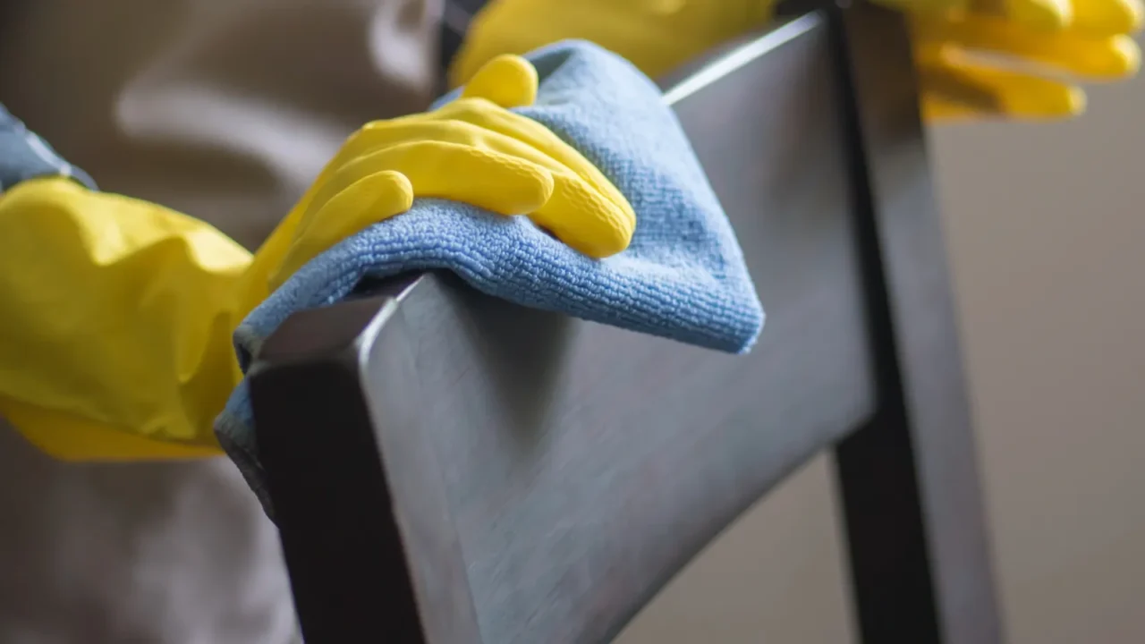 portrait of asian woman cleaning service staff cleaning dining table