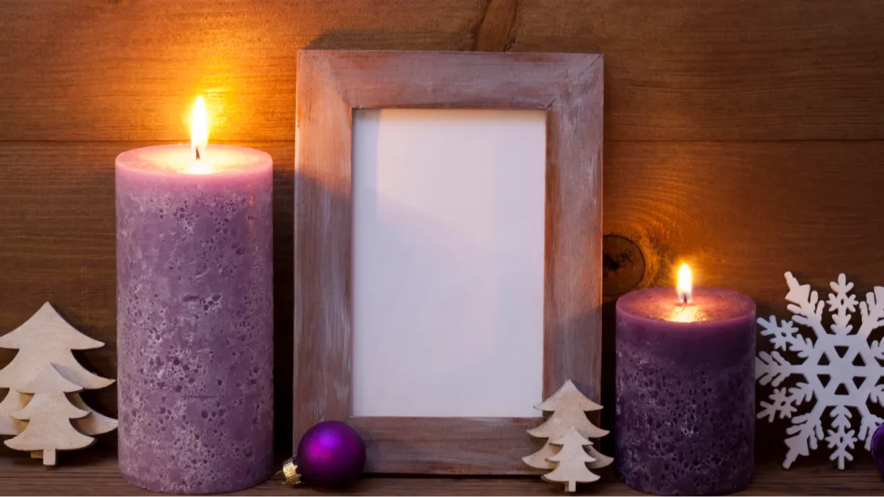 Purple Christmas decoration with candles picture frame, and snowflake. decor