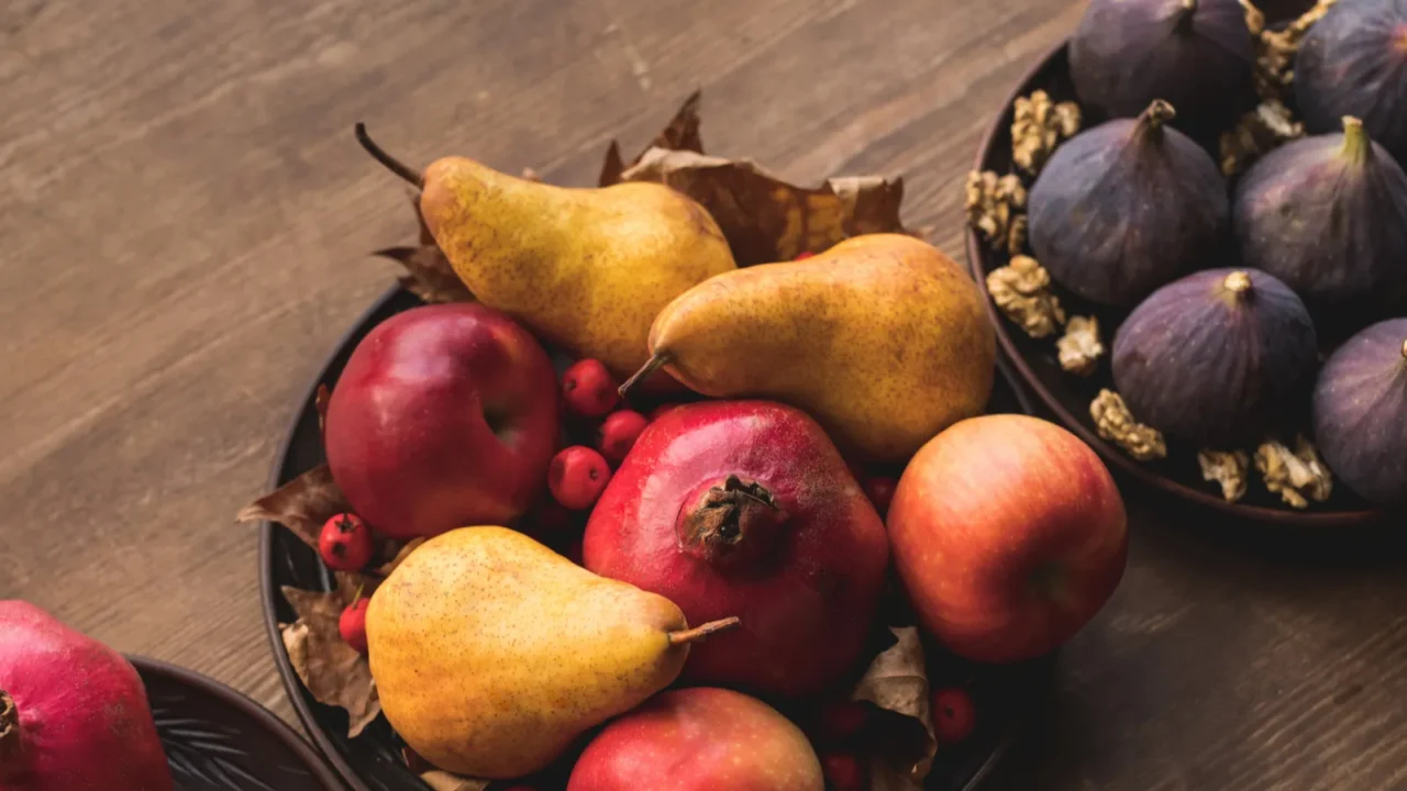 Fresh seasonal fruits on table.