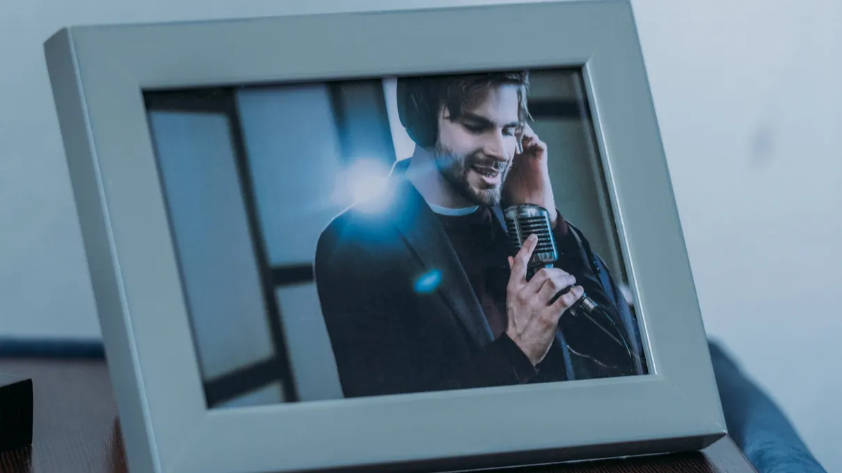 selective focus of photo frame with picture of man marriage