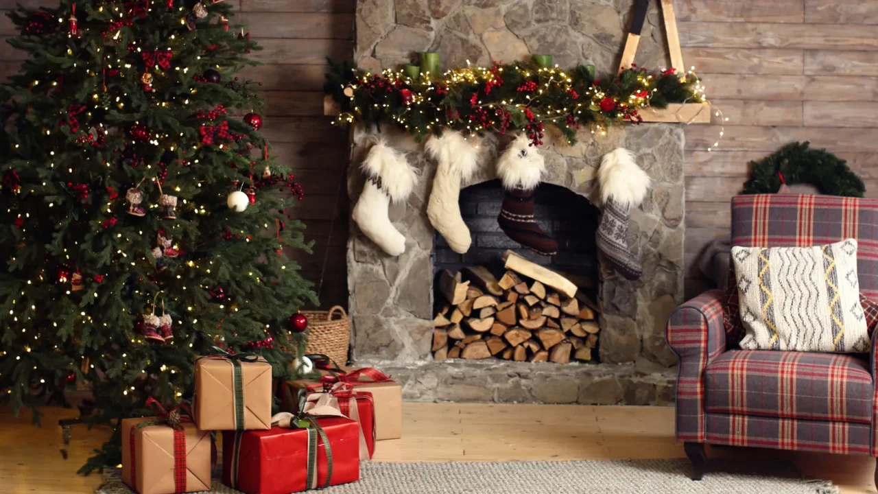 stylish interior of room with beautiful christmas tree and fireplace