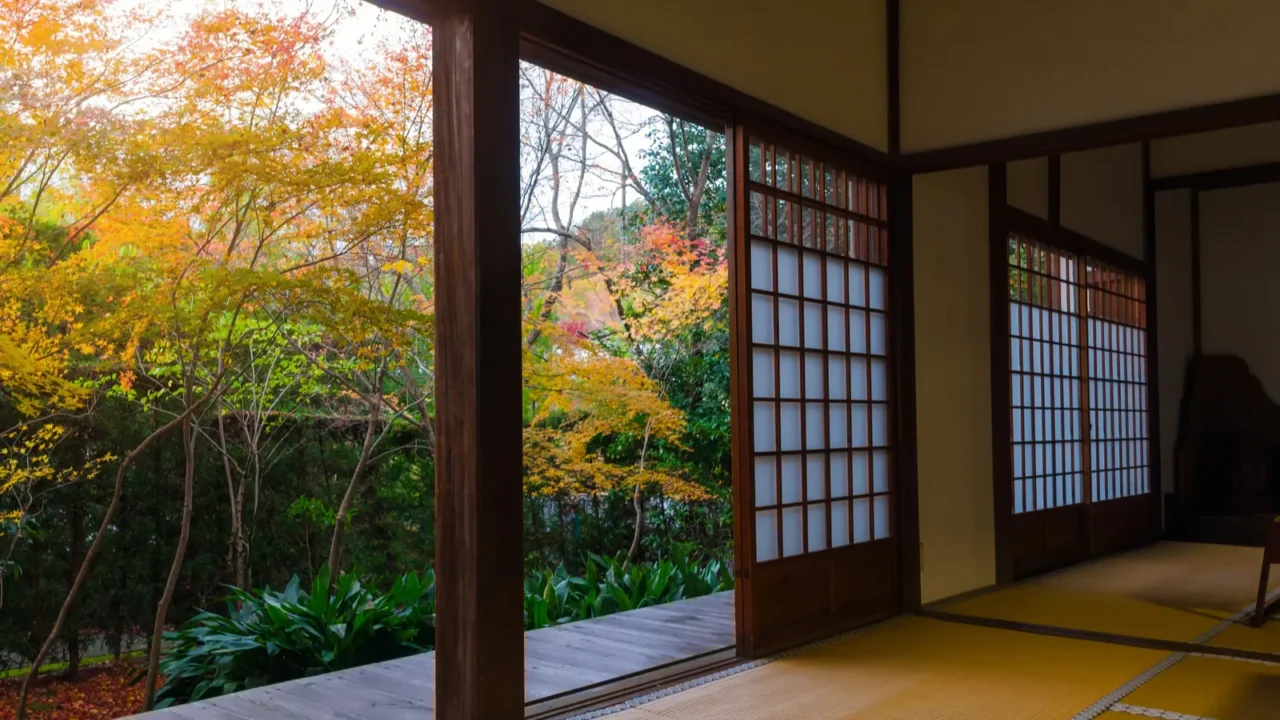 traditional japanese paper sliding doors and tatami mat open to