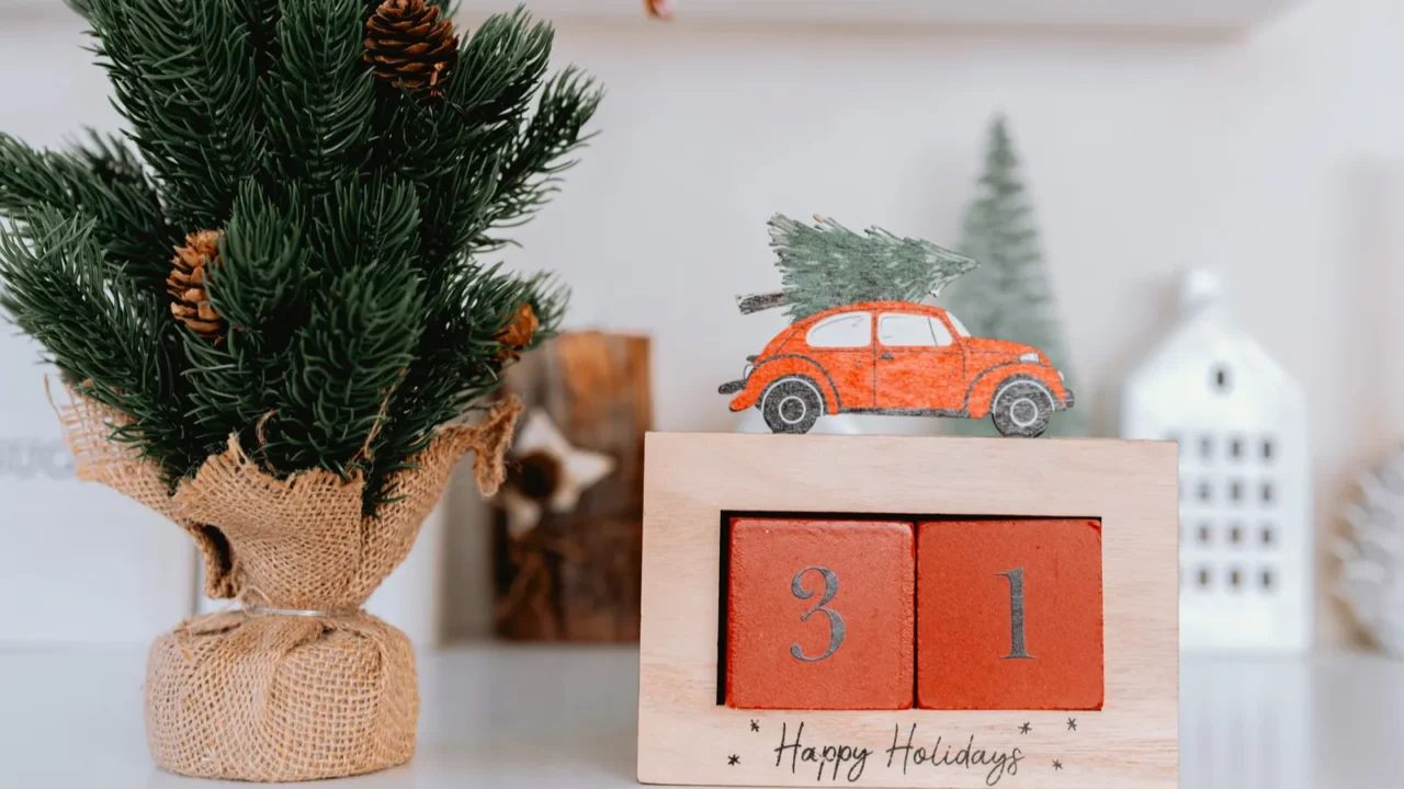 a cozy holiday display features a small evergreen tree in