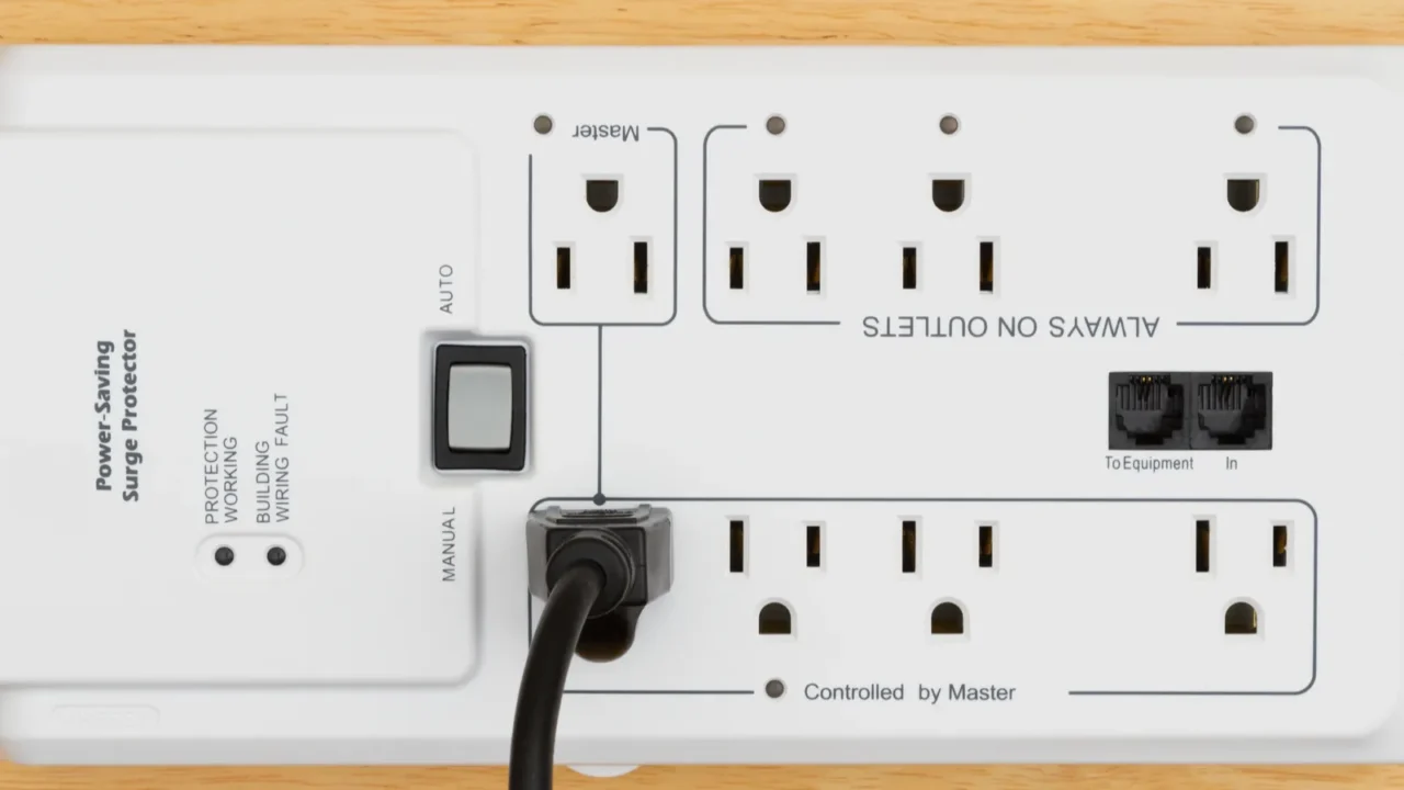 a power saving surge protector on wood with power