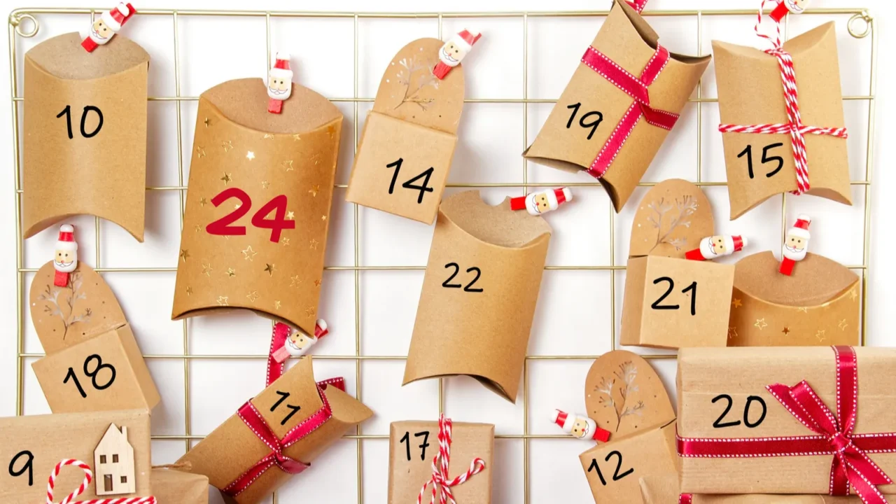 advent calendar with craft carton boxes on the mesh board