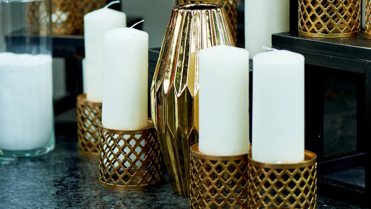 Beautiful Indonesian carved candle holders with white wax candles. Warm and beautiful setting.