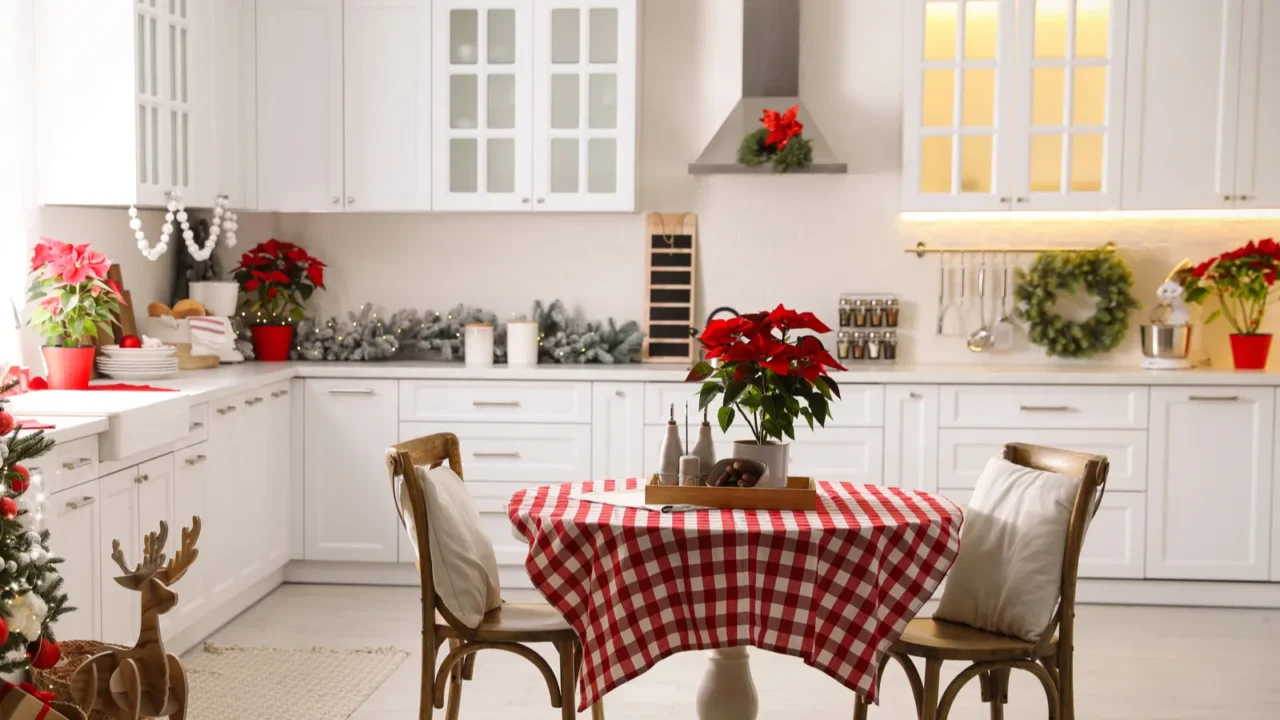 beautiful kitchen interior with christmas tree and festive decor