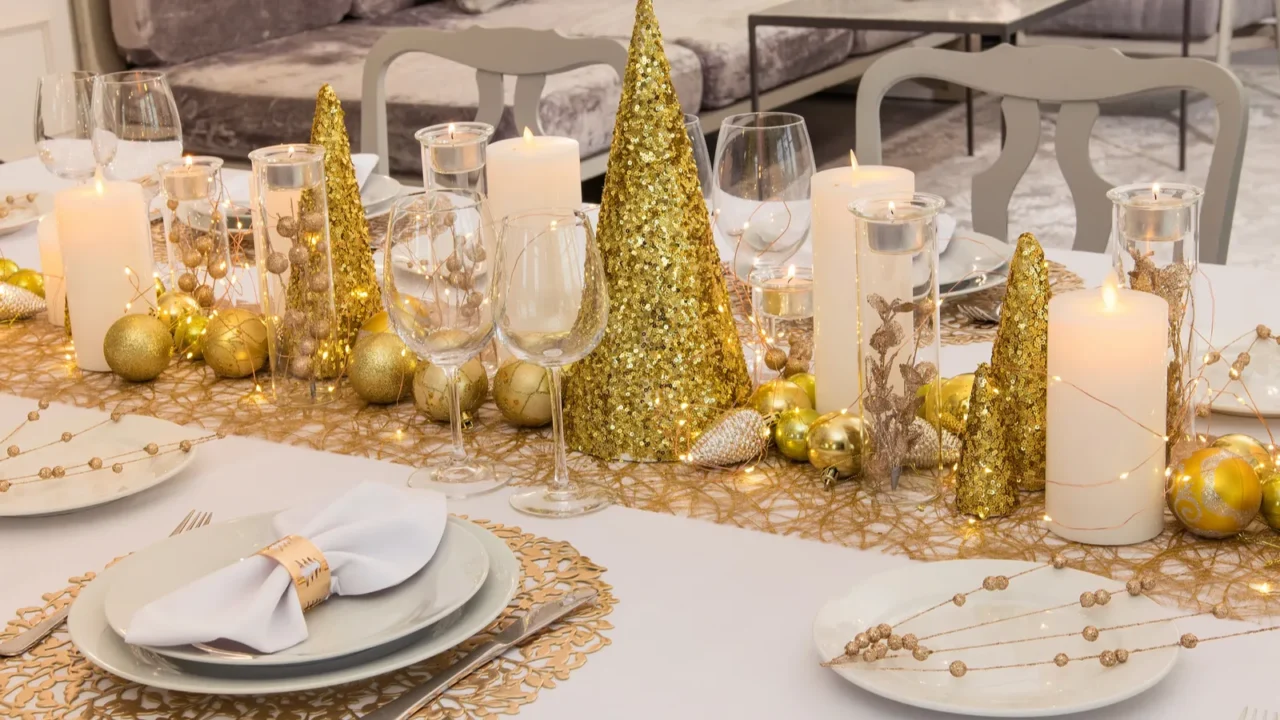 beautiful table setting with christmas decorations gold colors