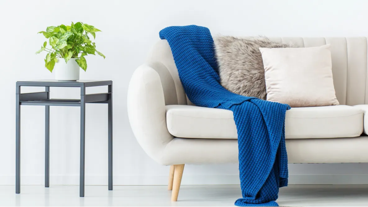 blue blanket on settee