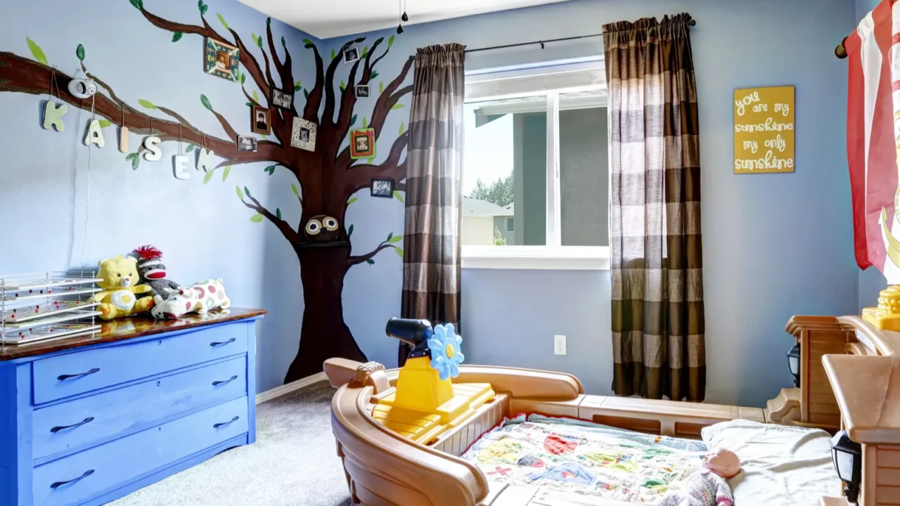 cheerful kids room with boat bed