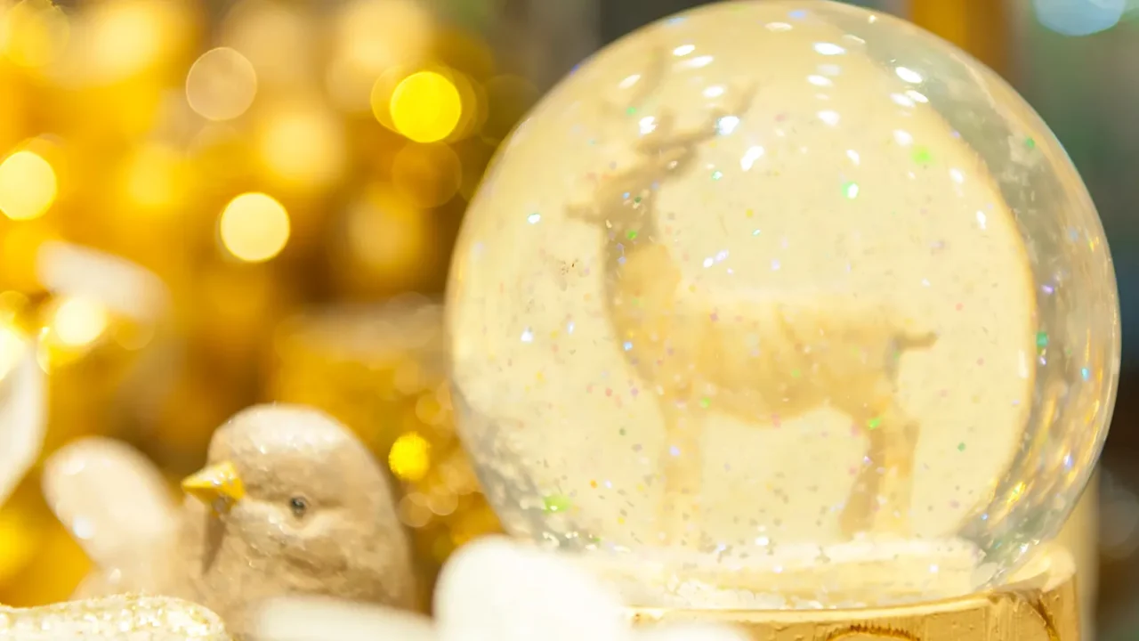 christmas snow globe with an deer in inside