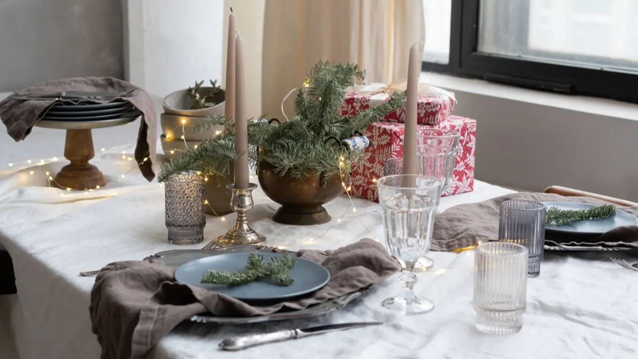 christmas table setting linen tablecloth and napkins on the table