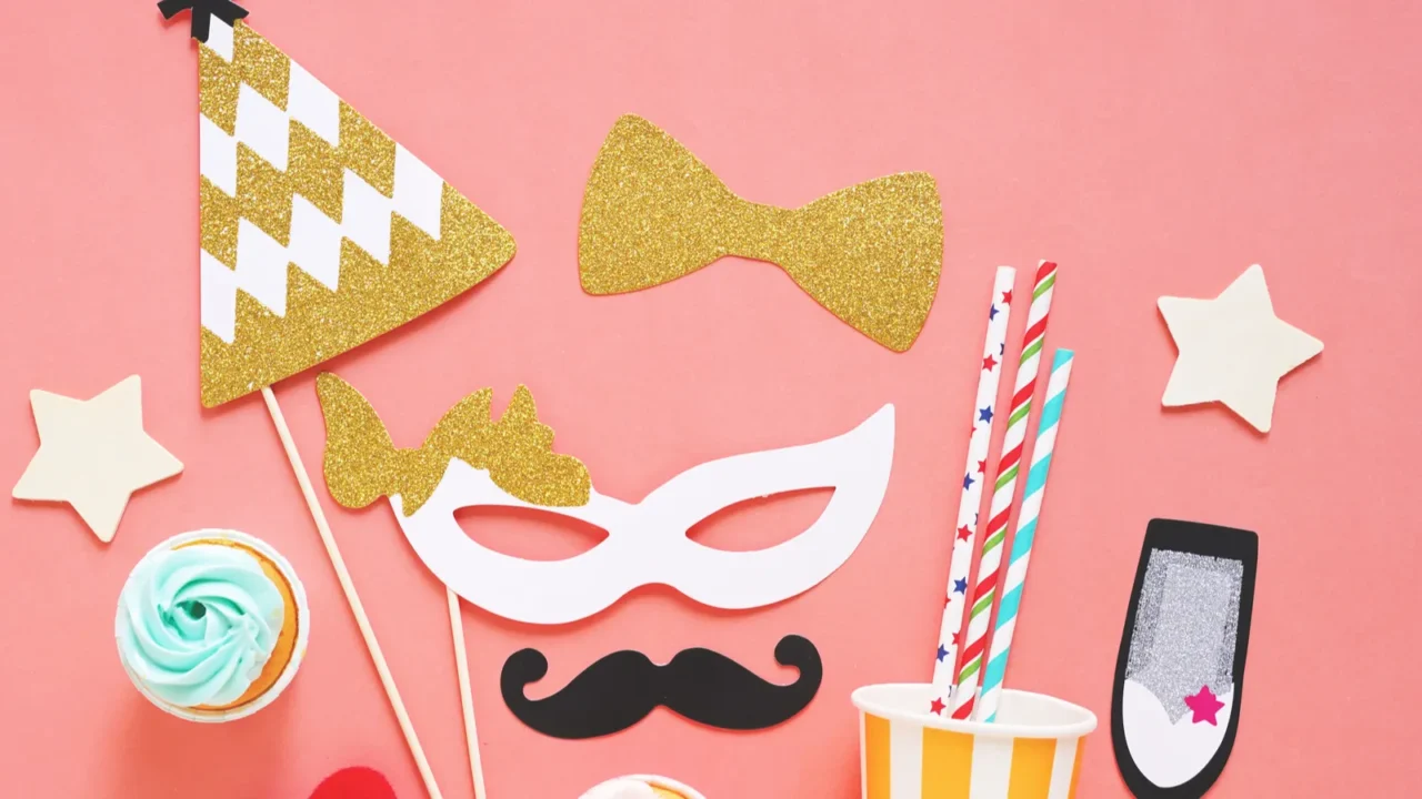 cute party props cakes on colorful background happy new year